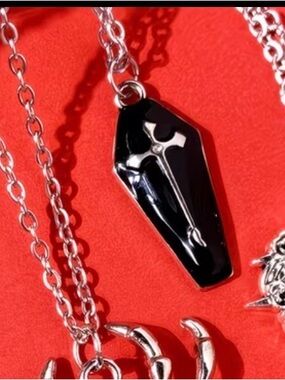 2️⃣ Black Coffin Pendant Necklace with Silver Cross Accent